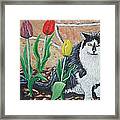Cat By The Tulips Framed Print
