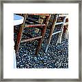 Chairs In A Row Framed Print