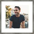 Cheerful Latin Man Traveling Around Europe Framed Print