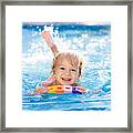 Child Learning To Swim. Kids In Swimming Pool. Framed Print