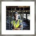 Confident Architect Standing At Construction Site Framed Print