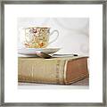Cup Of Tea And Book Framed Print