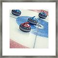 Curling Stones Framed Print