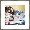 Cute Little Girl Painting With Mommy Together At Home, Portrait Of Mother And Daughter Painting At Home Framed Print