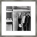 Dresses Hanging In A Closet Framed Print