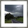Driving Into A Storm Framed Print