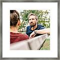 Father And Daughter Talking Framed Print