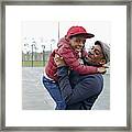 Father And Son (4-5) Playing In Park Framed Print