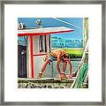 Fisherman Working On His Boat Framed Print