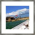 Fishing Boat Approaches Shack Framed Print