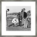 Five Golfers Looking At A Ball Framed Print