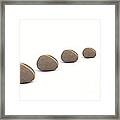 Five Queuing Pebbles Against White Background Framed Print
