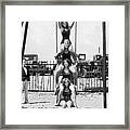 Four Girls On A Swing Set Framed Print