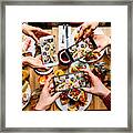 Friends Taking Pictures Of Food On The Table With Smartphones During Brunch In Restaurant Framed Print