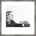 Genevieve Fath Holding A Rose Framed Print