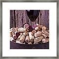 Glass Of Wine With Corks Framed Print