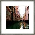 Gliding Along The Canal Framed Print
