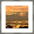 Golden Clouds Framed Print