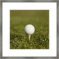 Golf Ball On A Tee Framed Print