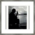 Guitarist By The Sea Framed Print