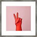 Hand In Red Rubber Glove Making Peace Framed Print