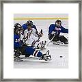 Handicapped Ice Hockey Players Framed Print