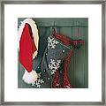 Hanging Stockings And Santa Hat On Hook Framed Print