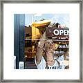 Happy Business Owner Hanging An Open Sign At A Cafe Framed Print