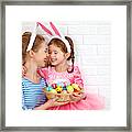 Happy Easter! Family Mother And Child Daughter With Ears Hare Getting Ready For Holiday Framed Print