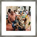 Happy Mexican Grandparents And Grandson Playing With Balloon Framed Print