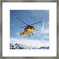Helicopter In The Mountains Framed Print