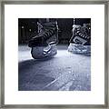 Hockey Skates On Ice Framed Print