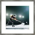 Ice Hockey Player Passing Puck. Framed Print