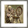 Irish Woman And Spinning Wheel Framed Print