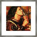 Joan Of Arc Kissing The Sword Framed Print