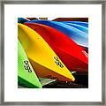 Kayaks Await Framed Print