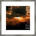 Light Beyond The Clouds Framed Print