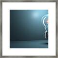 Light Bulb Glowing Framed Print