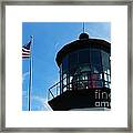 Lighthouse With Flag Framed Print