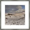 Limestone Boulders And Snow Framed Print