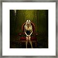 Magical Red Chair Framed Print