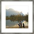 Man And Dog Beside Lake In Mountains, Rear View Framed Print