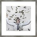 Man Throwing Dollar Bills In The Air, Arms Raised In Celebration Framed Print