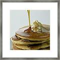 Maple Syrup Being Poured Onto A Stack Of Pancakes Framed Print