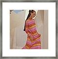 Marisa Berenson In A Bright Striped Dress Framed Print