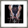 Mid Adult Woman Cycling, Studio Shot Framed Print