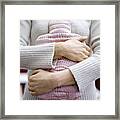 Mid Section Shot Of A Woman Holding A Pink Water Bottle Against Her Stomach Framed Print