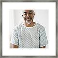 Mixed Race Older Man Sitting On Hospital Bed Framed Print