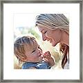 Mother And Daughter Laughing Framed Print