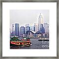 Old Traditional Chinese Junk In Front Of Hong Kong Skyline Framed Print